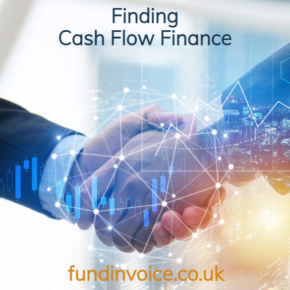 Shaking hands on a cash flow finance deal for a UK company.
